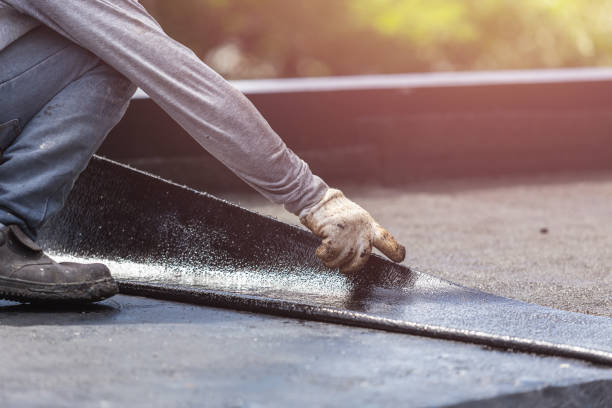 Professional Exterior Waterproofing technician working in Hersey, MI